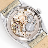 vintage rolex oysterdate wristwatch movement shot