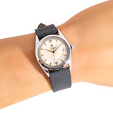 vintage rolex oysterdate red date wrist shot, close up