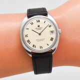 vintage universal geneve white shadow ww, wrist shot close up