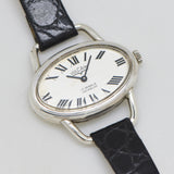 vintage vulcain oval shaped timepiece, on its back