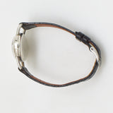 vintage vulcain oval shaped timepiece, side of the case with crown