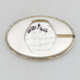 vintage vulcain oval shaped timepiece, interior case back