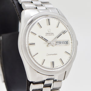dial on an omega seamaster day date